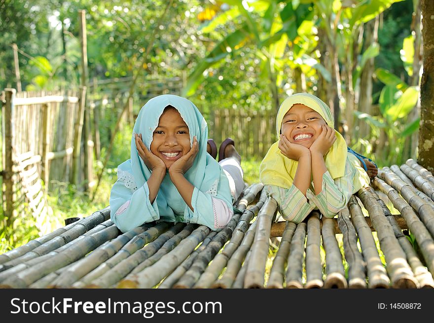 Outdoor portrait of happy Muslim kids. Outdoor portrait of happy Muslim kids