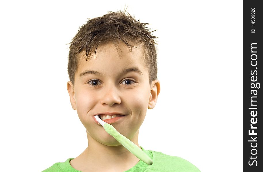 Boy with toothbrush in his mouth