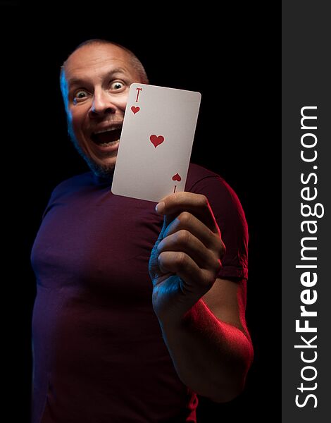 A man holds a deck of play cards