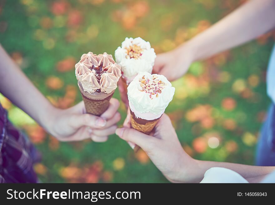 Women Hand Holding An Ice Cream Collide And Happy. The Time Of Relaxation.