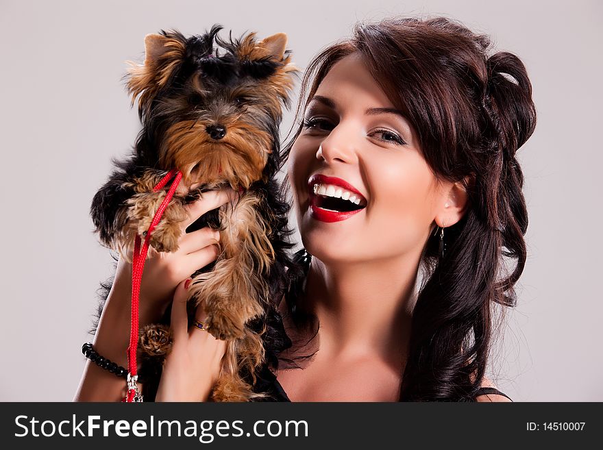 Young Woman With A Little Dog