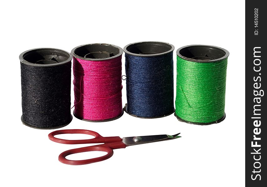 Multi-coloured threads on a white background. Multi-coloured threads on a white background
