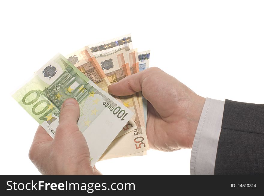 Businessman hand with money isolated on white background