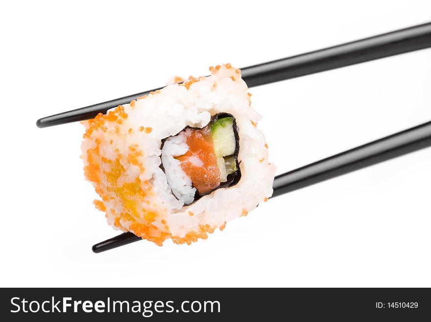 An image of a tasty piece of sushi in chopsticks. An image of a tasty piece of sushi in chopsticks