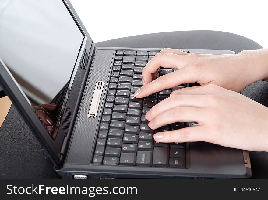 Female hands working on laptop