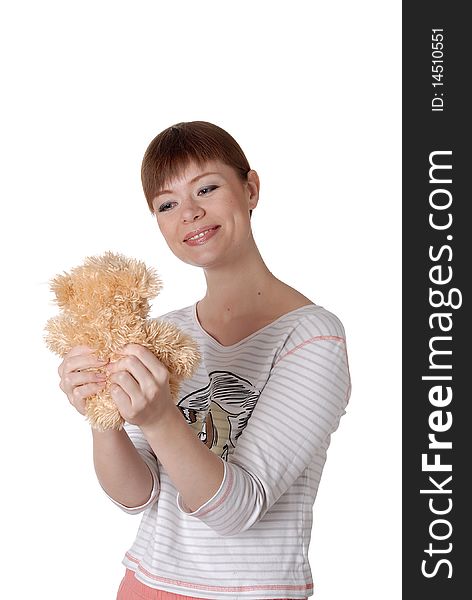 Charming young woman with Teddy in the hands