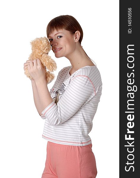 Charming young woman with Teddy in the hands