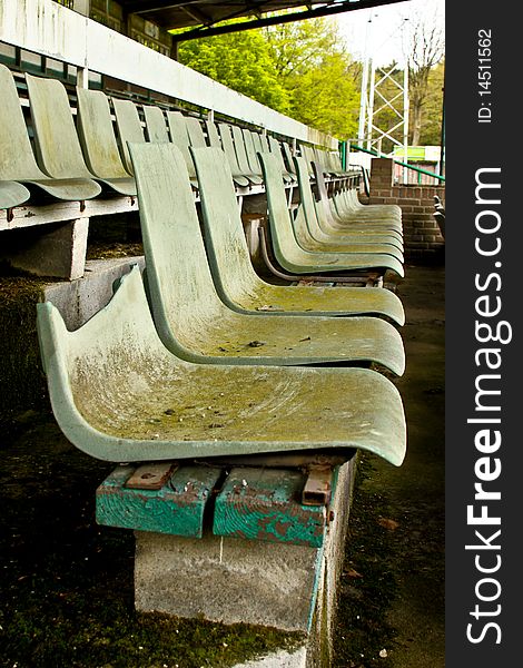 Seats in old football stadium