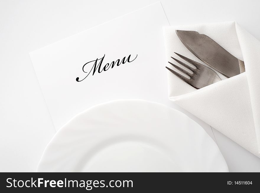 An image of a plate, knife and fork. An image of a plate, knife and fork