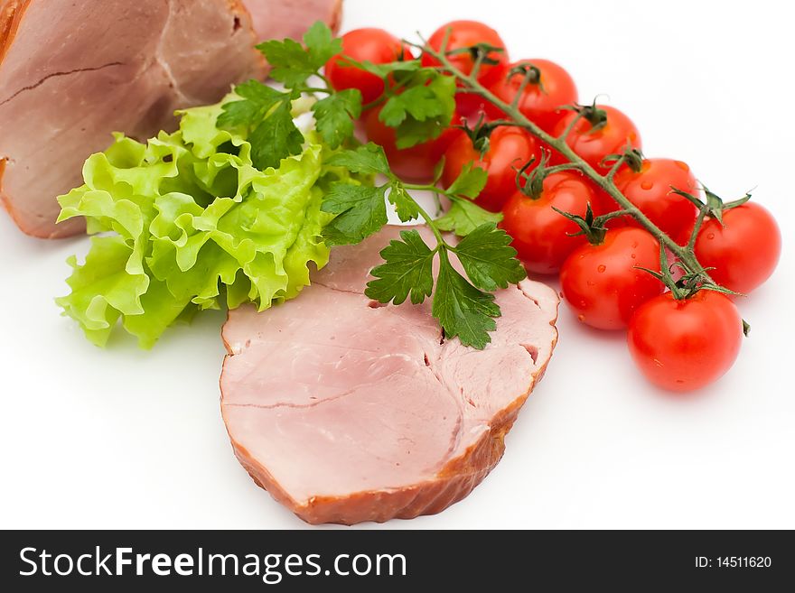 An image of juicy meat and red tomatoes. An image of juicy meat and red tomatoes