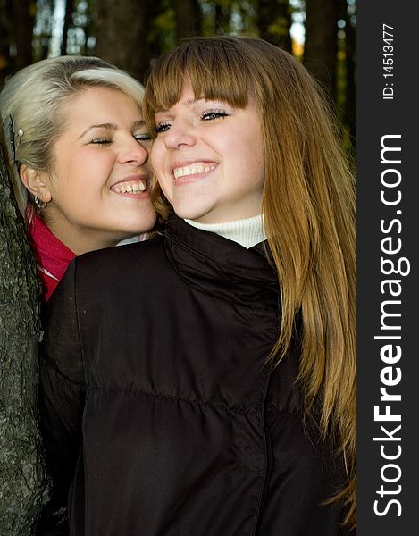 Two young women on a walk in park