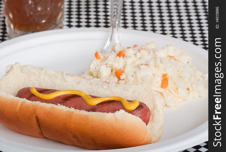 Hot dog on a bun with cole slaw