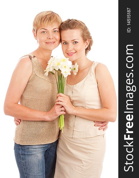Smiling mother and daughter  with flowers isolated on white