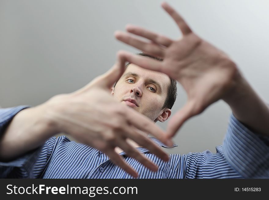 Purposeful man over grey background