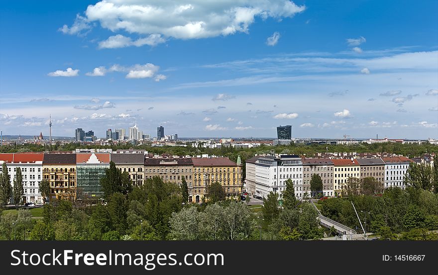 Skyline in the back are from famous Donau City (Donaupark) part of the danube valley. In front the green heart of vienna called Prater. Row of houses at the SchÃ¼ttelstrasse, beside the Danube Canal. Skyline in the back are from famous Donau City (Donaupark) part of the danube valley. In front the green heart of vienna called Prater. Row of houses at the SchÃ¼ttelstrasse, beside the Danube Canal.