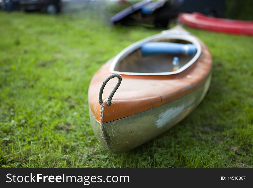 Boat on the grass with soft blur.