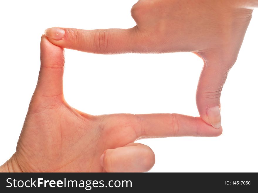 Woman's hands forming a frame. Isolated on a white background.