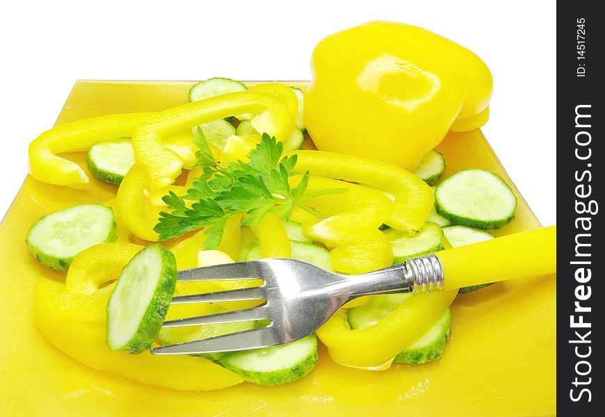 Vegetable salad with yellow pepper and cucumber