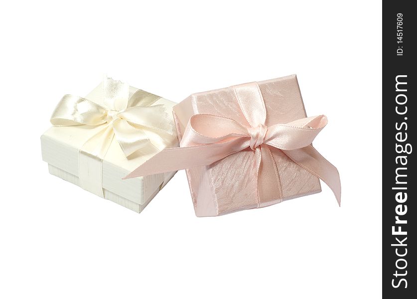 Small boxes with ribbons and bows to wrap gifts. Small boxes with ribbons and bows to wrap gifts