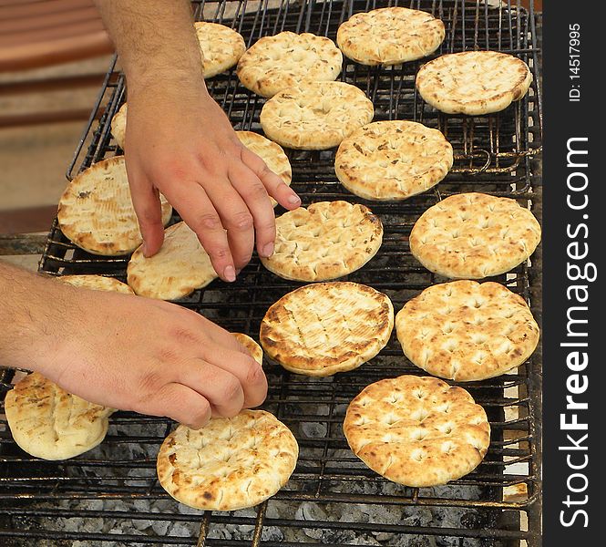 Hot Greek Pita Bread on the grill. Barbecue