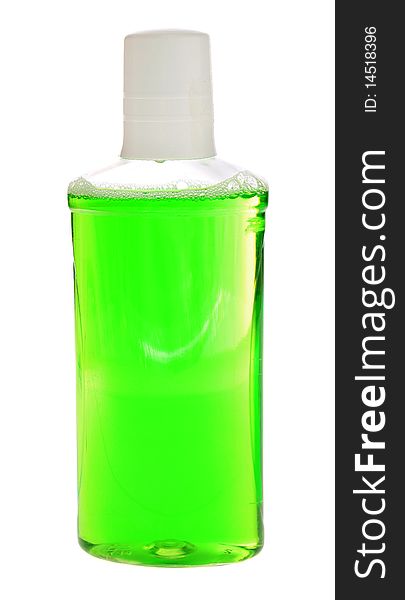 Bottle with green water, it is isolated on a white background. Bottle with green water, it is isolated on a white background.