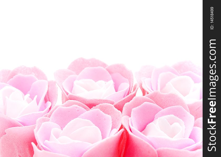 Buds of artificial pink roses close up