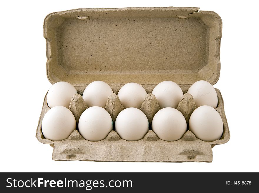 Ten eggs in the box isolated on the white
