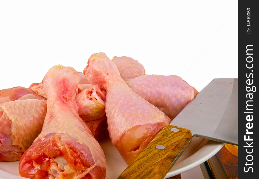 Fresh raw chicken legs. Close up on white background