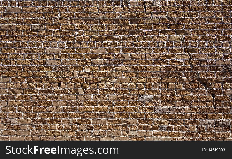 A background texture of a red brick wall. A background texture of a red brick wall