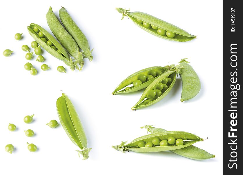 Garden green peas pods close-up on white background. Garden green peas pods close-up on white background.