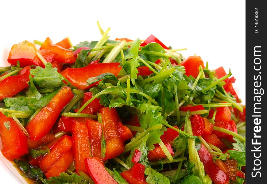 Fresh Coriander and sweet pepper salad. Close up