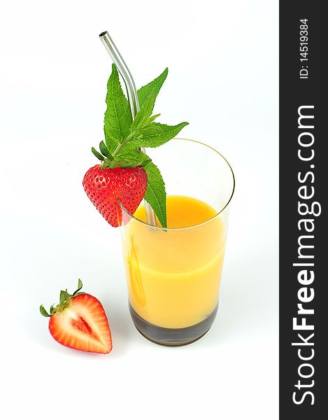 Orange cocktail with strawberry and spoon