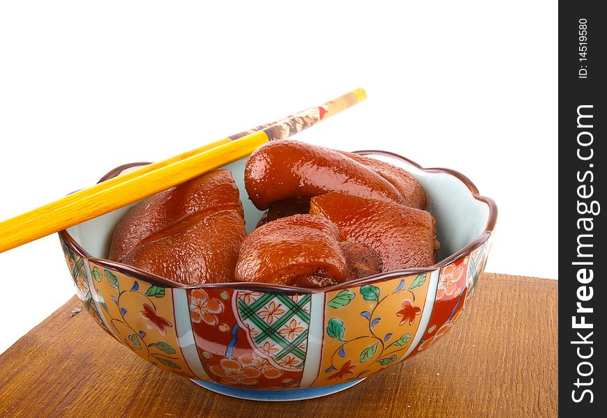 Traditional Chinese stew meat. Close up. White background