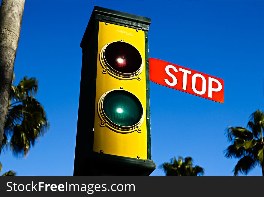 Traffic lights - green and red. Traffic lights with the stop sign.