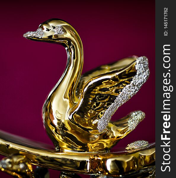 Gold Statuette Of Swan