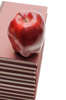 Stack Of Books And Apple Isolated Royalty Free Stock Photo