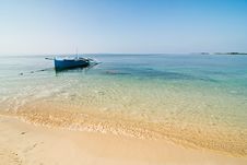 Blue Wooden Boat On A Pristine Beach Royalty Free Stock Photography Blue Wooden Boat On A Pristine Beach Royalty Free Stock Photography