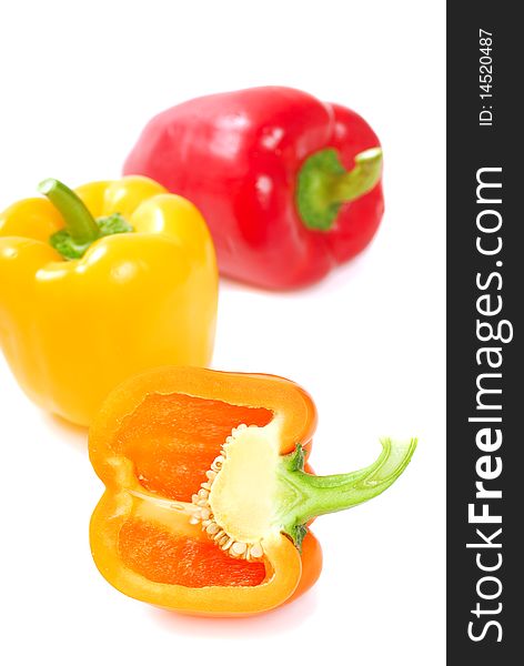 Fresh vibrant organic bell peppers in orange, yellow and red. Fresh vibrant organic bell peppers in orange, yellow and red