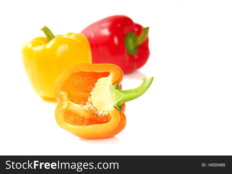 Orange, yellow and red bell peppers