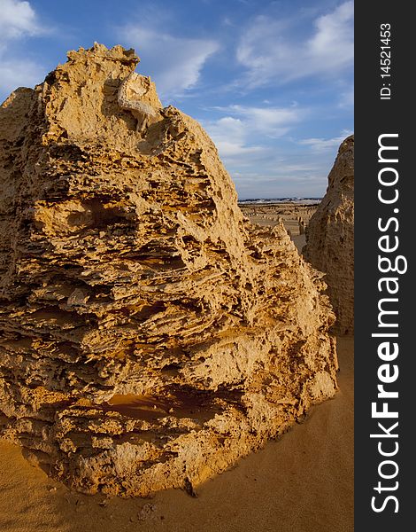 A close up shot of The Pinnacles of the Nambung National Park, Western Australia, showing detail of the layers in the rock.