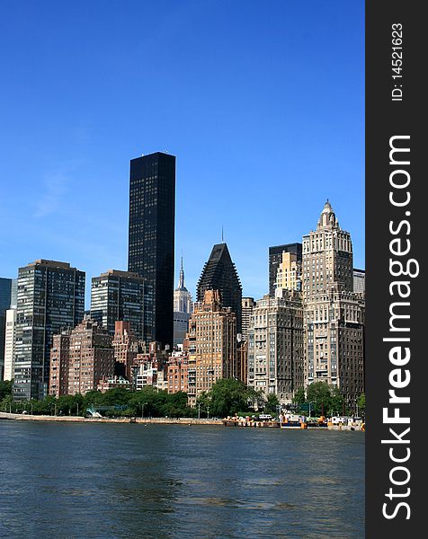 Midtown Manhattan skyline along the East River. Midtown Manhattan skyline along the East River.