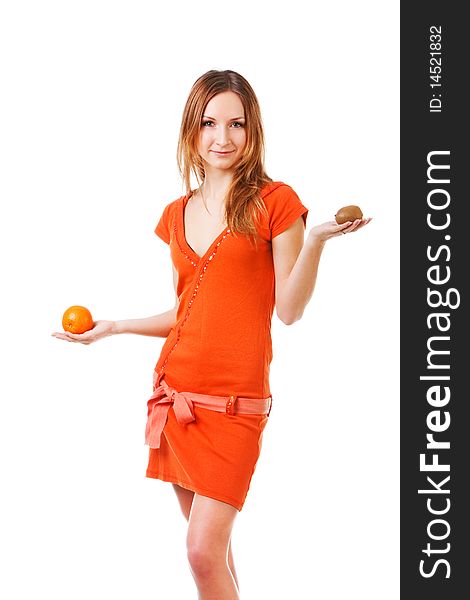 Young Pretty Girl In Dress With Orange And Kiwi