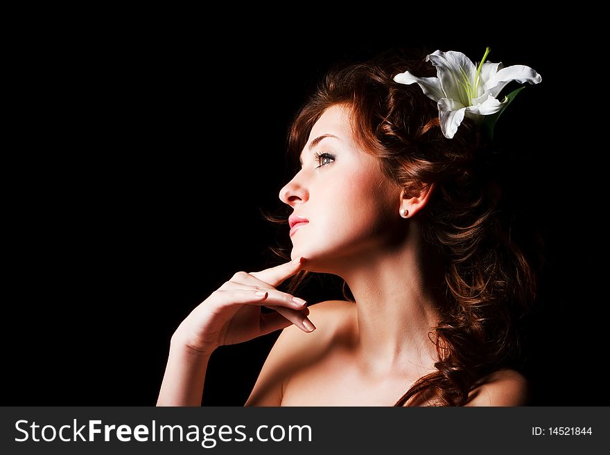 Portrait of a sweet young girl on black background. Portrait of a sweet young girl on black background.