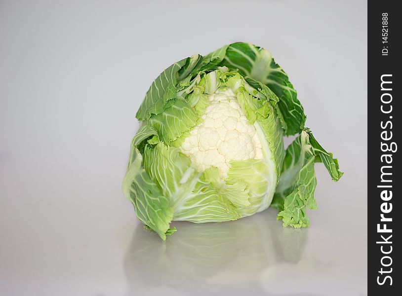 Healthy cauliflower isolated on cool grey