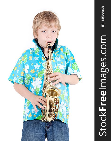 Boy plays on saxophone