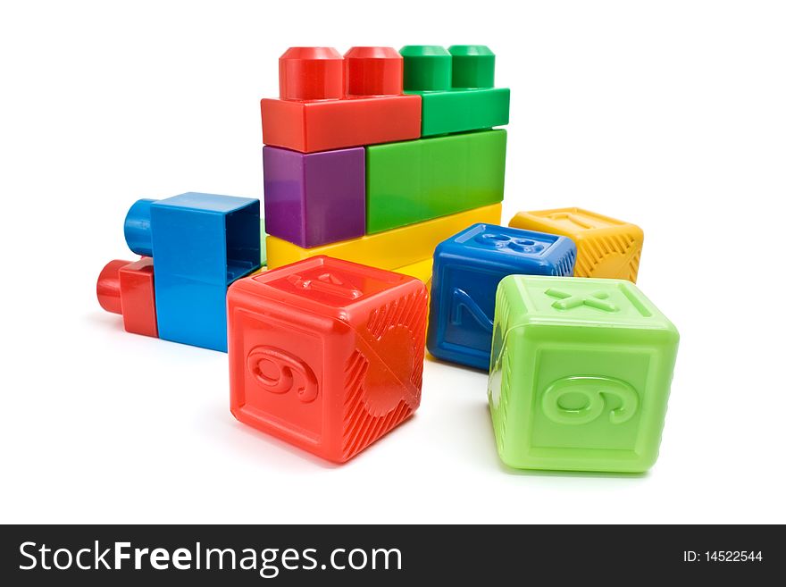 Plastic toy bricks on a white background