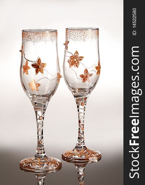 Two decorated glasses on isolated background. Two decorated glasses on isolated background