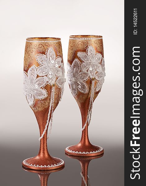 Two decorated glasses on isolated background. Two decorated glasses on isolated background