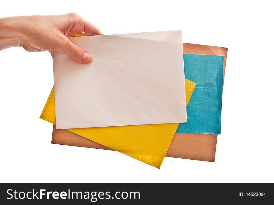 Many envelopes with letters in hand. Isolated on white