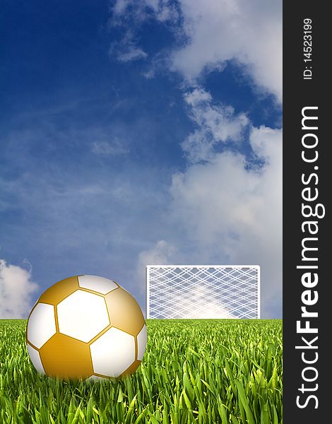 Golden football in grass field against goal and sky with clouds in background. Golden football in grass field against goal and sky with clouds in background